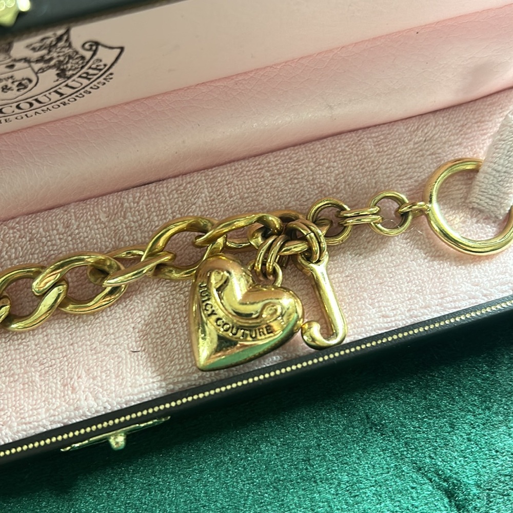 Juice Couture Charm bracelet. Perfect condition.